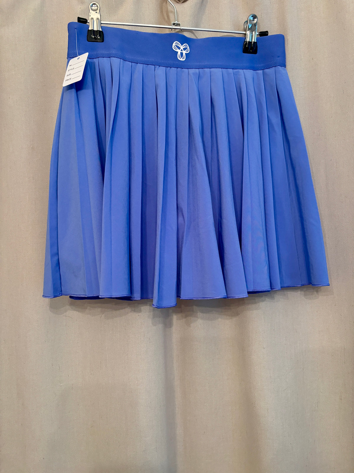 TnaMOVE™ Pleated Tennis Mini Skirt — Size S